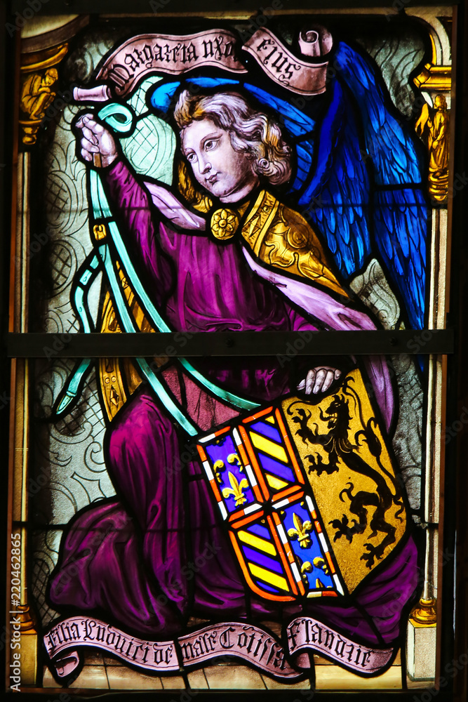 Fototapeta premium Stained Glass, Angel holding a Coat of Arms