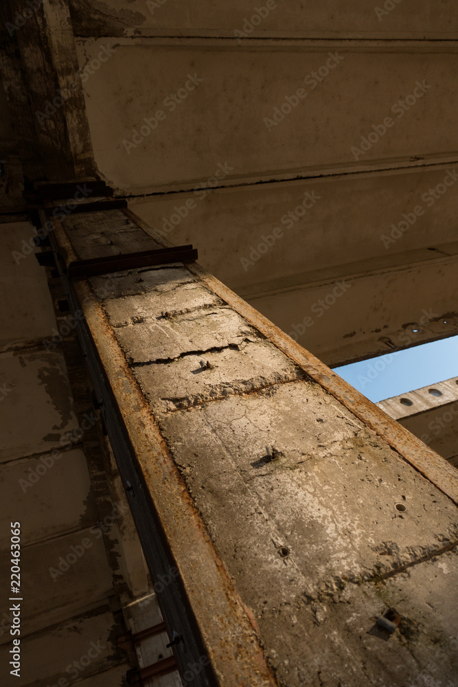 A deserted industrial plant site with old deserted structure on a beautiful sunset. A deserted industrial plant site with old deserted structure on a beautiful sunset.