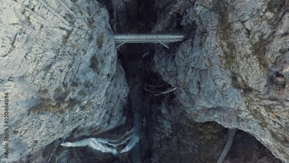 Drone Aerial Top View of the Vajont Dam in Italy, Slow Motion Top View of the Forest Valley with Rocks and Waterfalls Drone Aerial Top View of the Vajont Dam in Italy, Slow Motion Top View of the Forest Valley with Rocks and Waterfalls