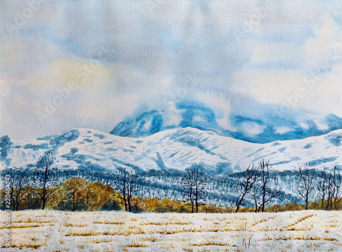 Winter mountain landscape. A cloudy day, a snow-covered field with trees and mountains in the background. Watercolor painting on paper.