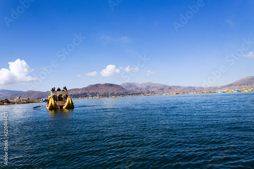 Yellow boat in Uros lake