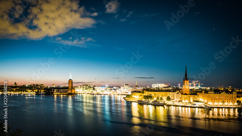 Panoramic view of Old Town in Sweden - Stockholm  Gamla Stan  in a summer night. Reflection