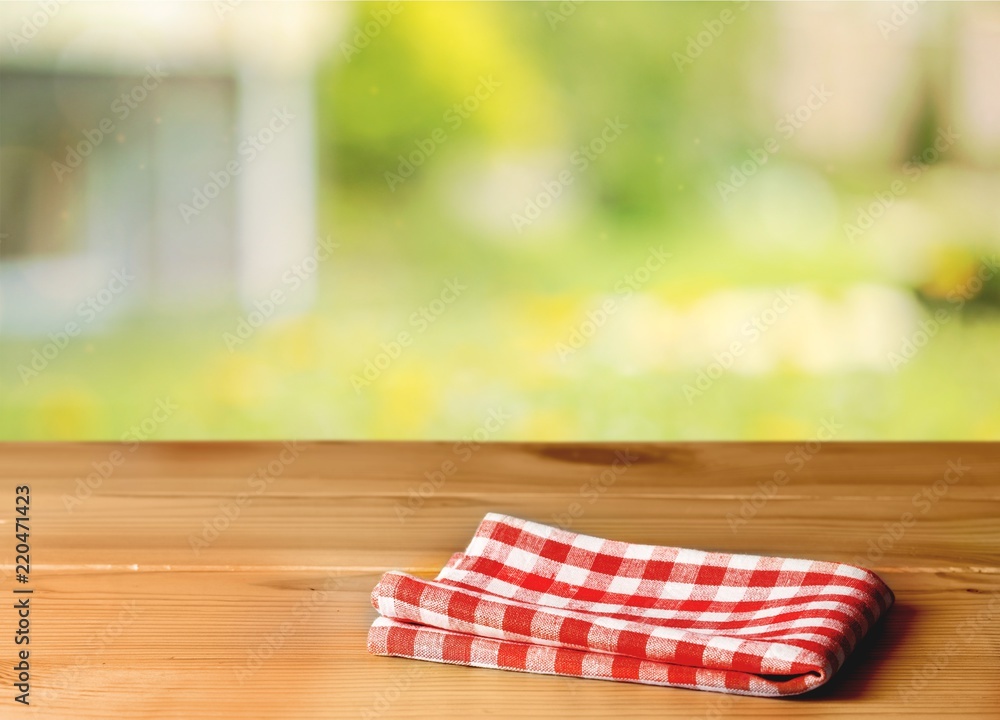 Obraz premium Worn table and blur with bokeh grass background