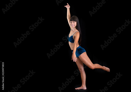 Wallpaper Mural Dancing ballerina looking down with a smile Torontodigital.ca