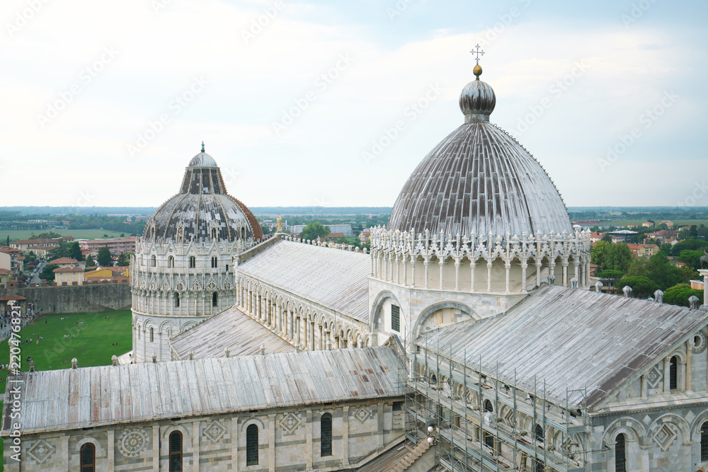 Pisa, Italy - July 26, 2018: Pisa Cathedral or Cattedrale Metropolitana Primaziale di Santa Maria Assunta viewed from Leaning Tower of Pisa 