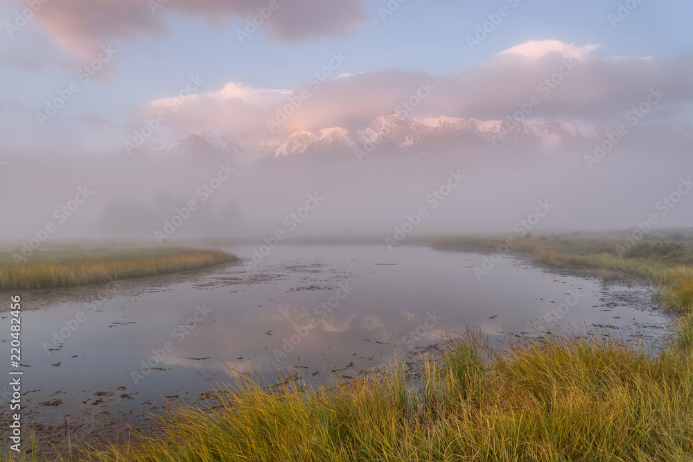 lake mountains fog reflection sunrise