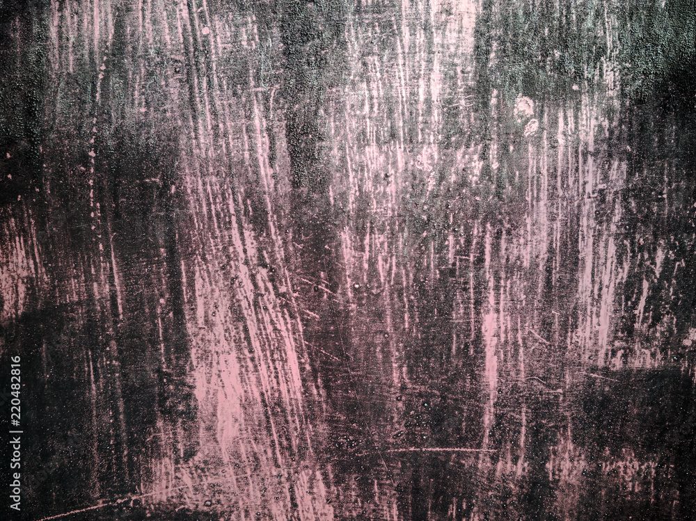 Obraz premium Close-up of cracked paint on metal wall