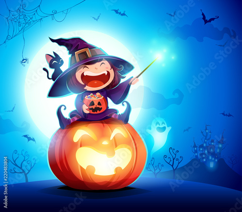 Halloween little witch. Girl kid in Halloween costume sits on a giant pumpkin. Magic wand and candies on hand. 