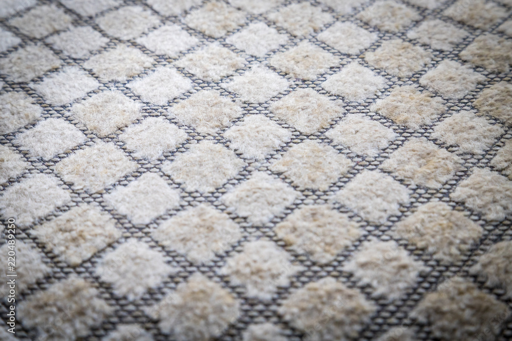 Fototapeta premium Gray fabric texture in a cage. Close up picture