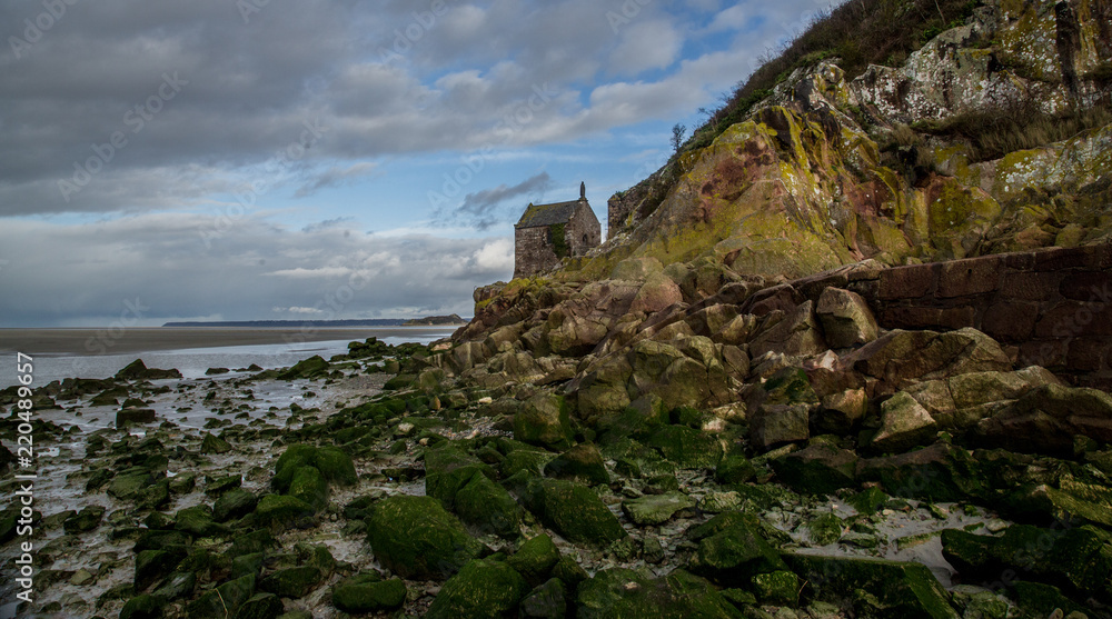 A small church on the Mont Saint-Michel at low tide