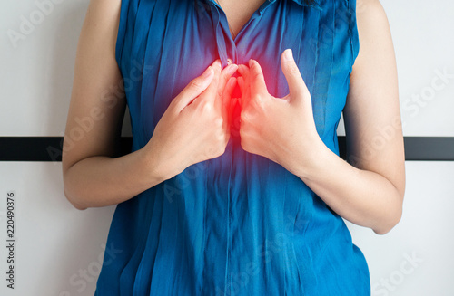 Принти на полотні Asian woman having or symptomatic reflux acids,Gerd disease