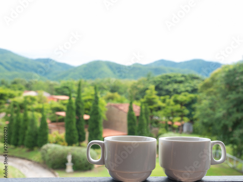 couple cup of coffee with mountains landscape. Beauty nature background, copy space, relax time