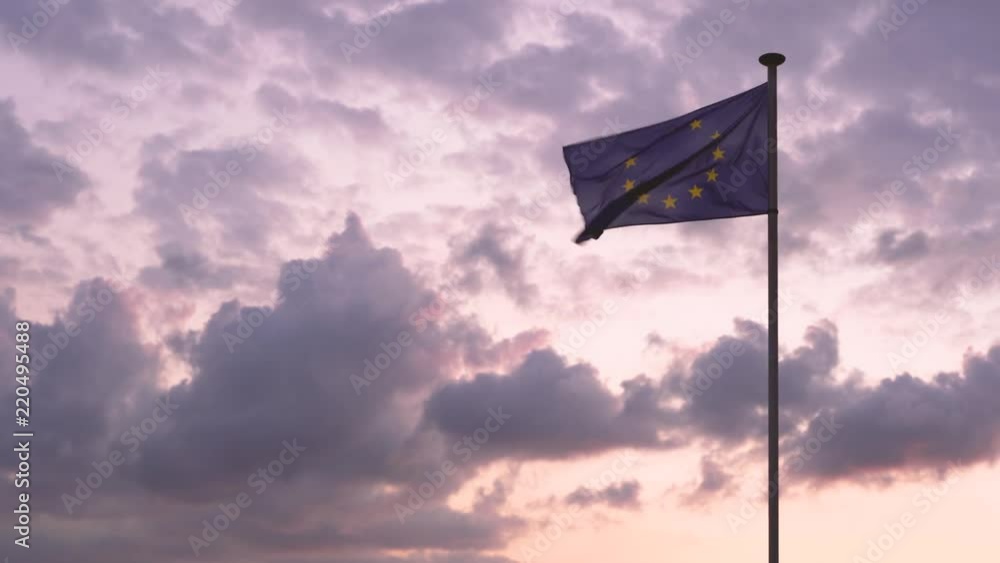 EU flag in the sunset clouds EU flag in the sunset clouds