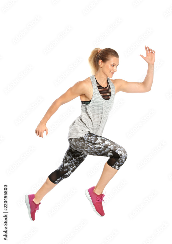 Obraz premium Sporty young woman running on white background