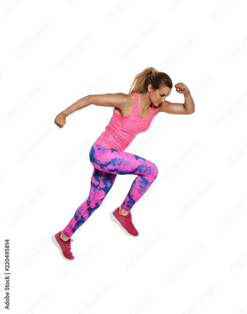 Sporty young woman running on white background