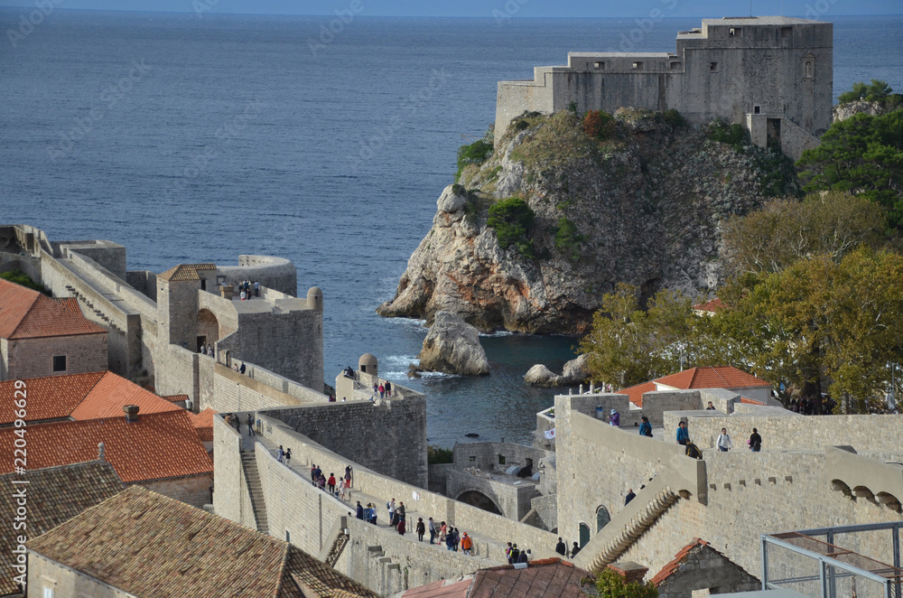Old City of Dubrovnik has managed to preserve its gothic, renaissance and baroque churches, monasteries, fortress & fountains. Red rooftops are the iconic look of the old city. Old City of Dubrovnik has managed to preserve its gothic, renaissance and baroque churches, monasteries, fortress & fountains. Red rooftops are the iconic look of the old city.
