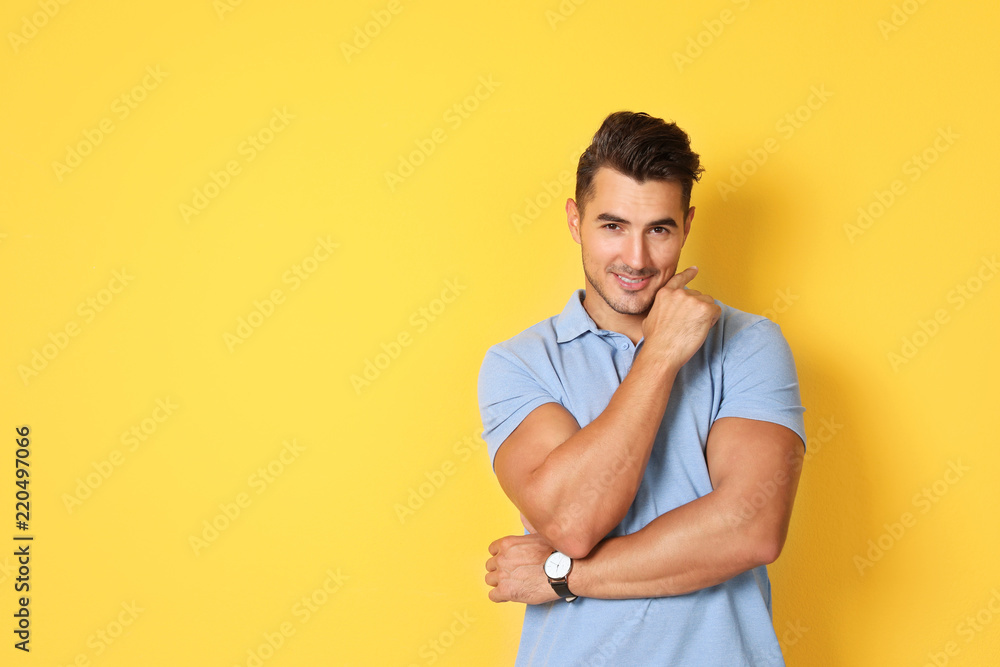 Portrait of handsome young man and space for text on color background Portrait of handsome young man and space for text on color background