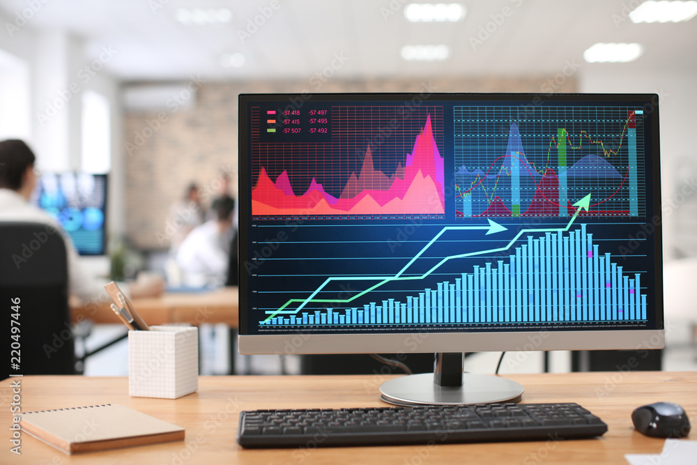 Computer screen with stock data in office. Finance trading Computer screen with stock data in office. Finance trading