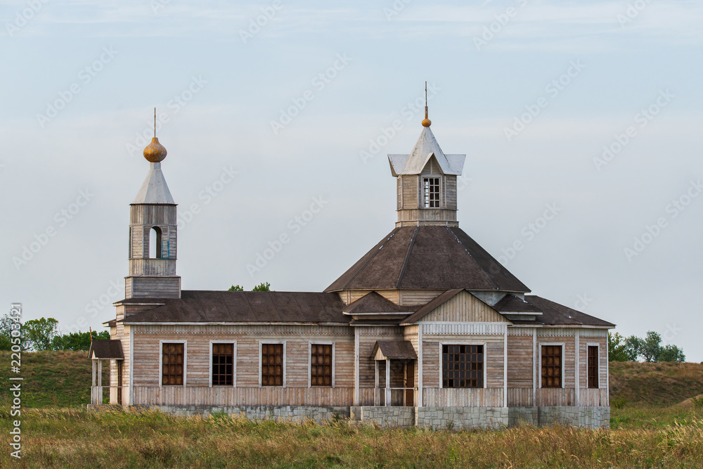 Traditional old russian wooden church in ancient town