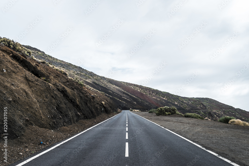 Rocky landscape with infinite road