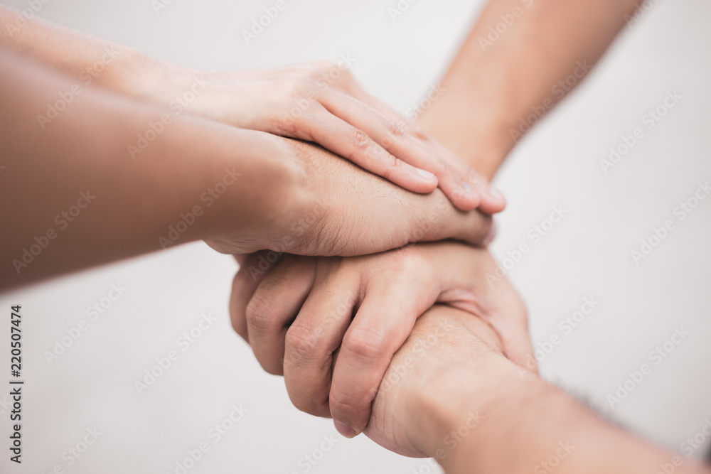 Close up teamwork stack of hands together. Togetherness Collaboration Concept Close up teamwork stack of hands together. Togetherness Collaboration Concept