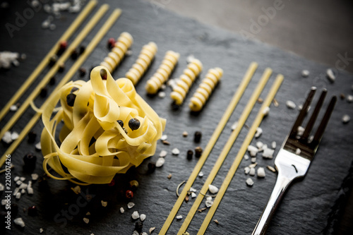 Close up of pasta with aromatic herbs and spices / Knolling concept