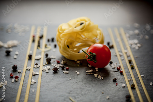 Pasta and cherry tomato close-up / Knolling concept