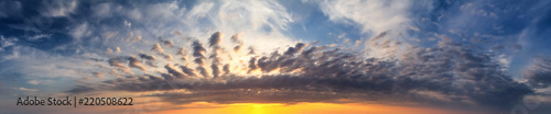 Fototapeta Naklejka Na Ścianę i Meble -  Beautiful summer sunset with a cloudy sky, panorama, banner