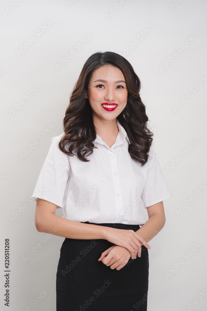 pretty business woman smile standing isolated on white background, model is a asian female