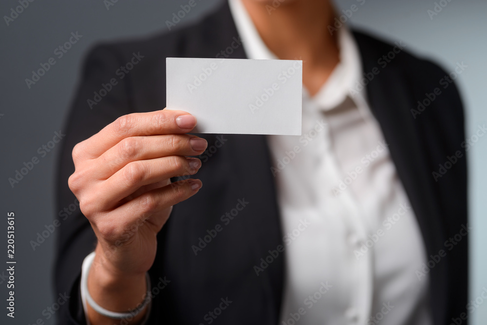 Fototapeta premium Female hand holds a card