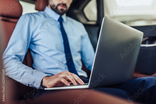 businessman using laptop computer © Afshar Tetyana