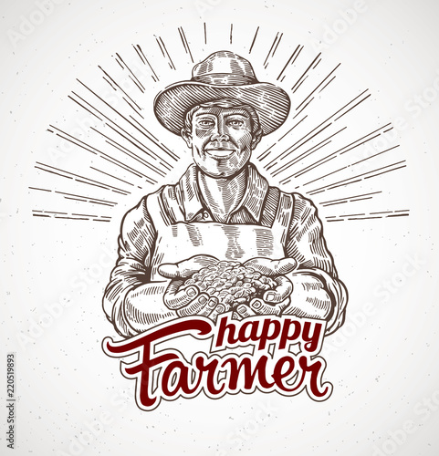 Happy farmer holding a handful of grain in his hands
