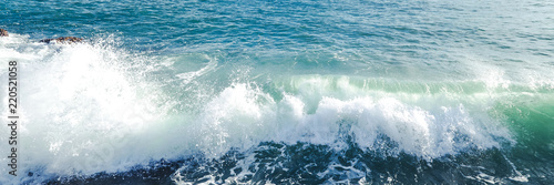 Wave on ocean, banner, sea wave close up photography. Macro photo of ocean foam