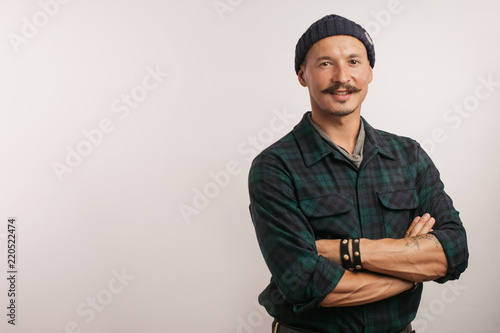 Fotografie Full length shot of a craftsman standing confidently with his arms folded in the