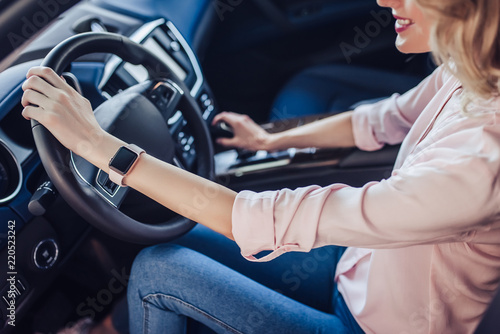 woman driving new car