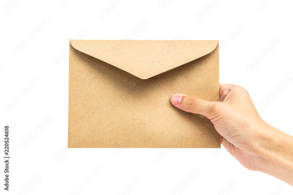 hand holding brown envelope isolated on white background with clipping path