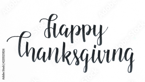 "Happy Thanksgiving" hand lettering inscription in black seasonal for those who celebrate Thanksgiving