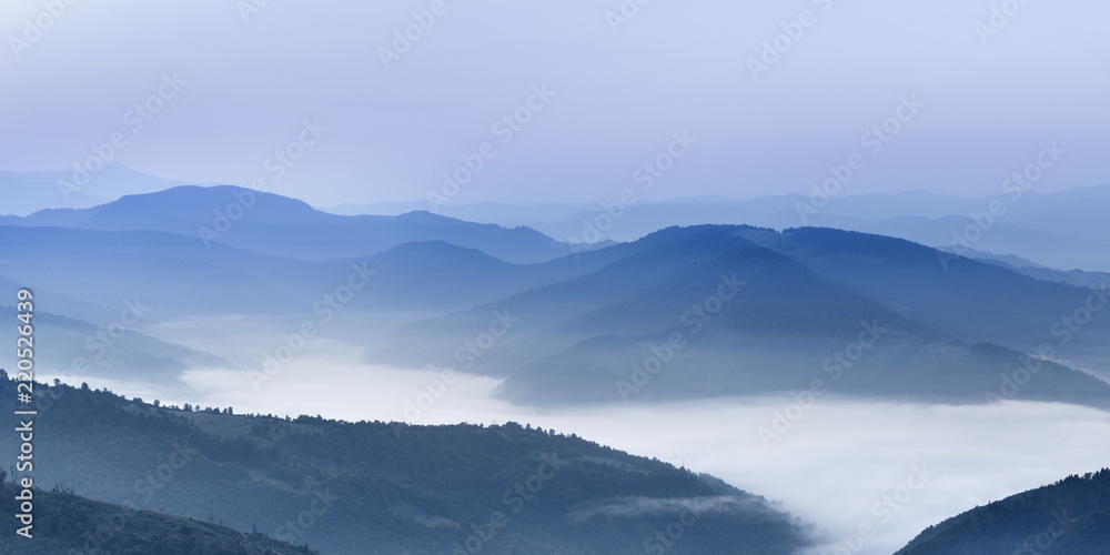Panoramic view of morning scene in high mountains. Blue color in nature. Fine background. Panoramic view of morning scene in high mountains. Blue color in nature. Fine background.