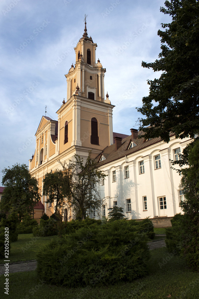 Sights and views of Grodno. Belarus. Bernardine church and monastery in the light of the setting sun.