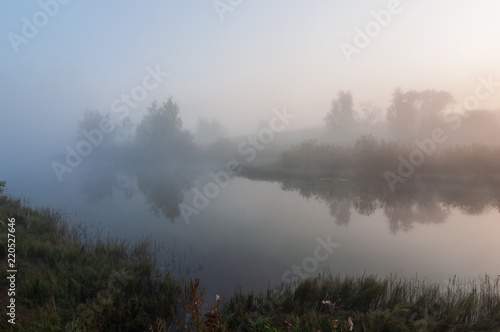 morning fog over the lake in the morning © androsov858