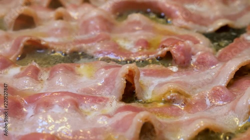 Bacon in a frying pan