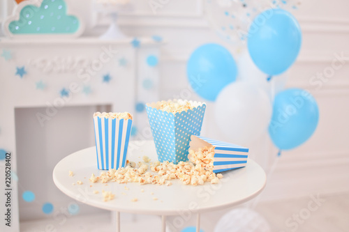 One year birthday decorations. Popcorn party. A lot of balloons. Decorations for holiday party. 