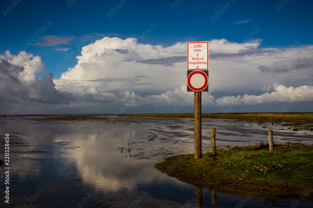 danger sign at the beach from husum, north sea