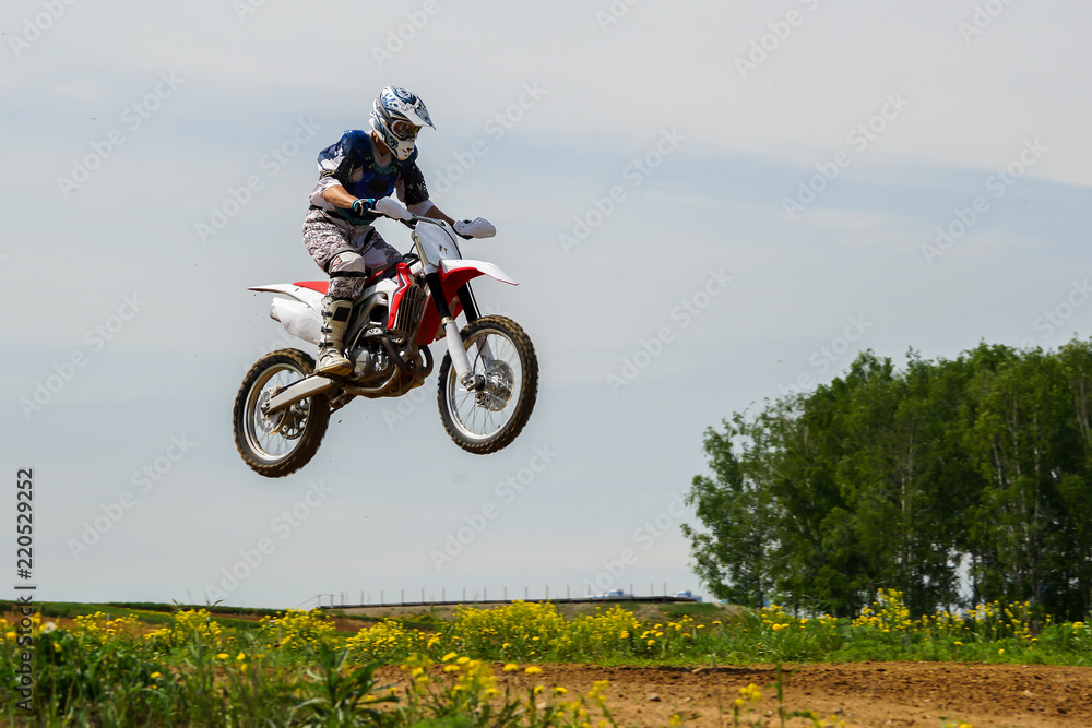 Obraz premium Motocross rider in the action