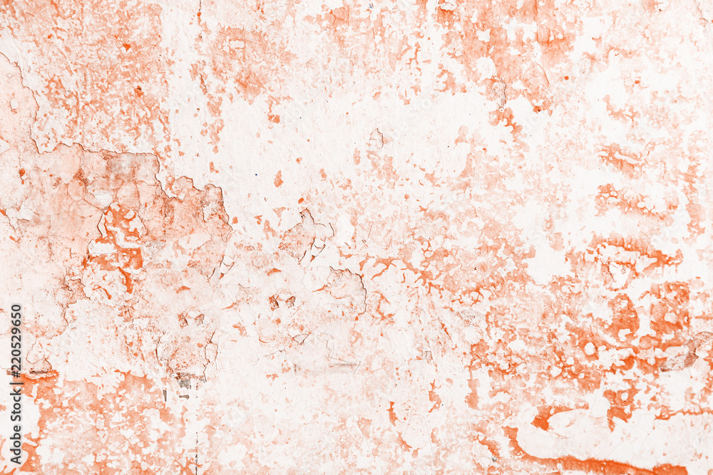 Fototapeta premium Wall with scuffs, cracks and old orange paint