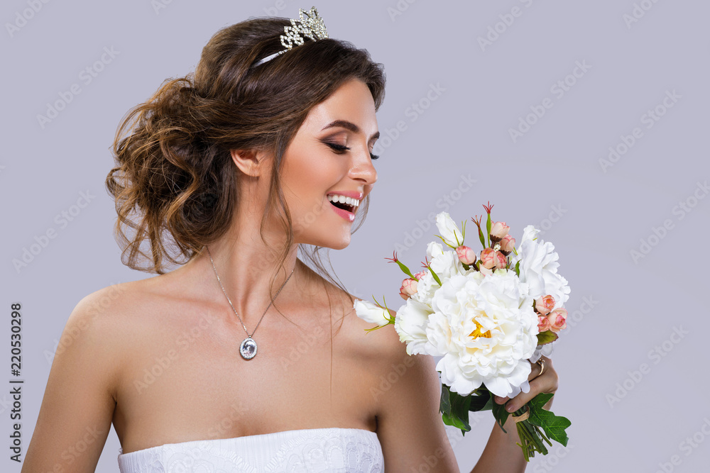 Portrait of young beautiful bride with bouquet of flowers Portrait of young beautiful bride with bouquet of flowers