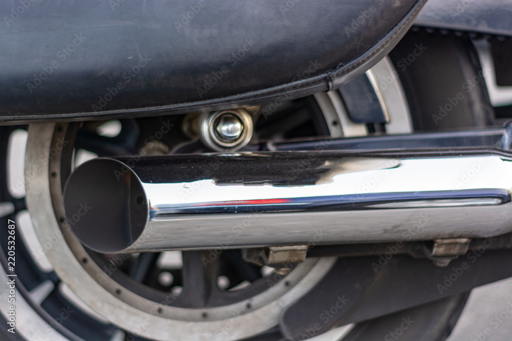 close-up of the rear wheel of the motorcycle exhaust pipe close-up of the rear wheel of the motorcycle exhaust pipe