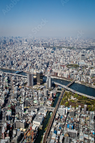 Fototapeta Naklejka Na Ścianę i Meble -  Aerial view of Skyscraper buildings in Tokyo City.Modern skyline and urban background