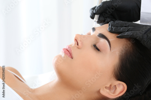 Young woman undergoing proc...