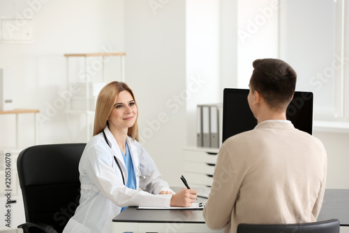 Female doctor consulting yo...